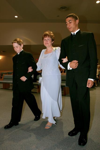 Mother and brothers of the groom